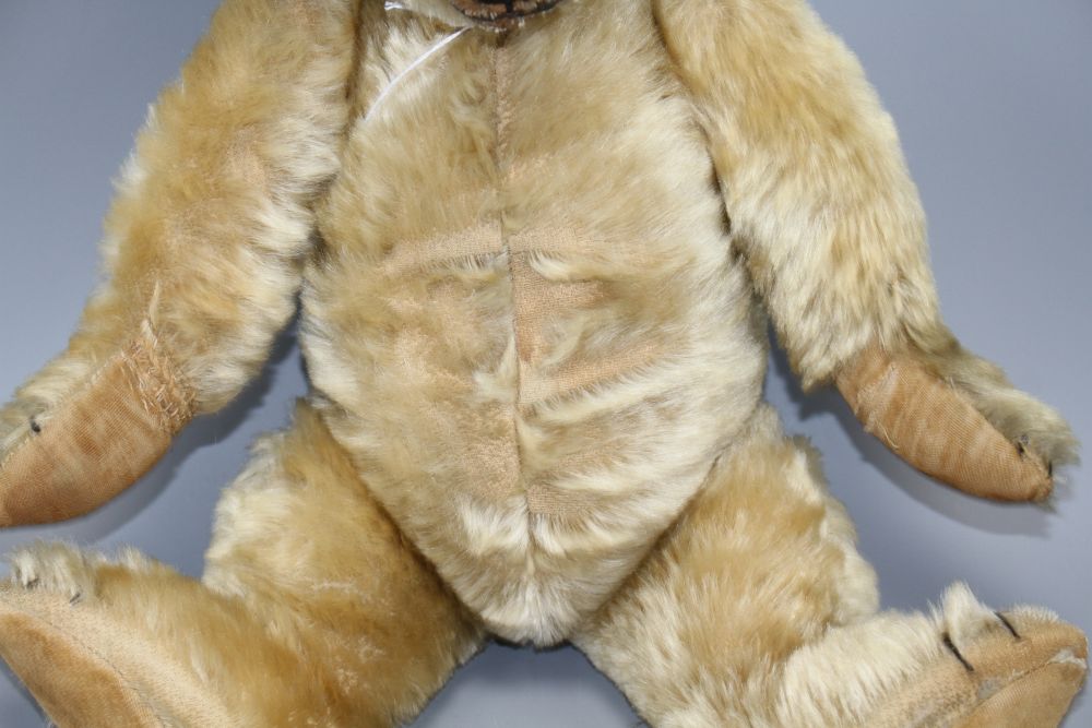 A Chiltern Hugmee c.1930 bear, 18in., blond mohair, hair loss front tummy, repair to right paw, split to left paw